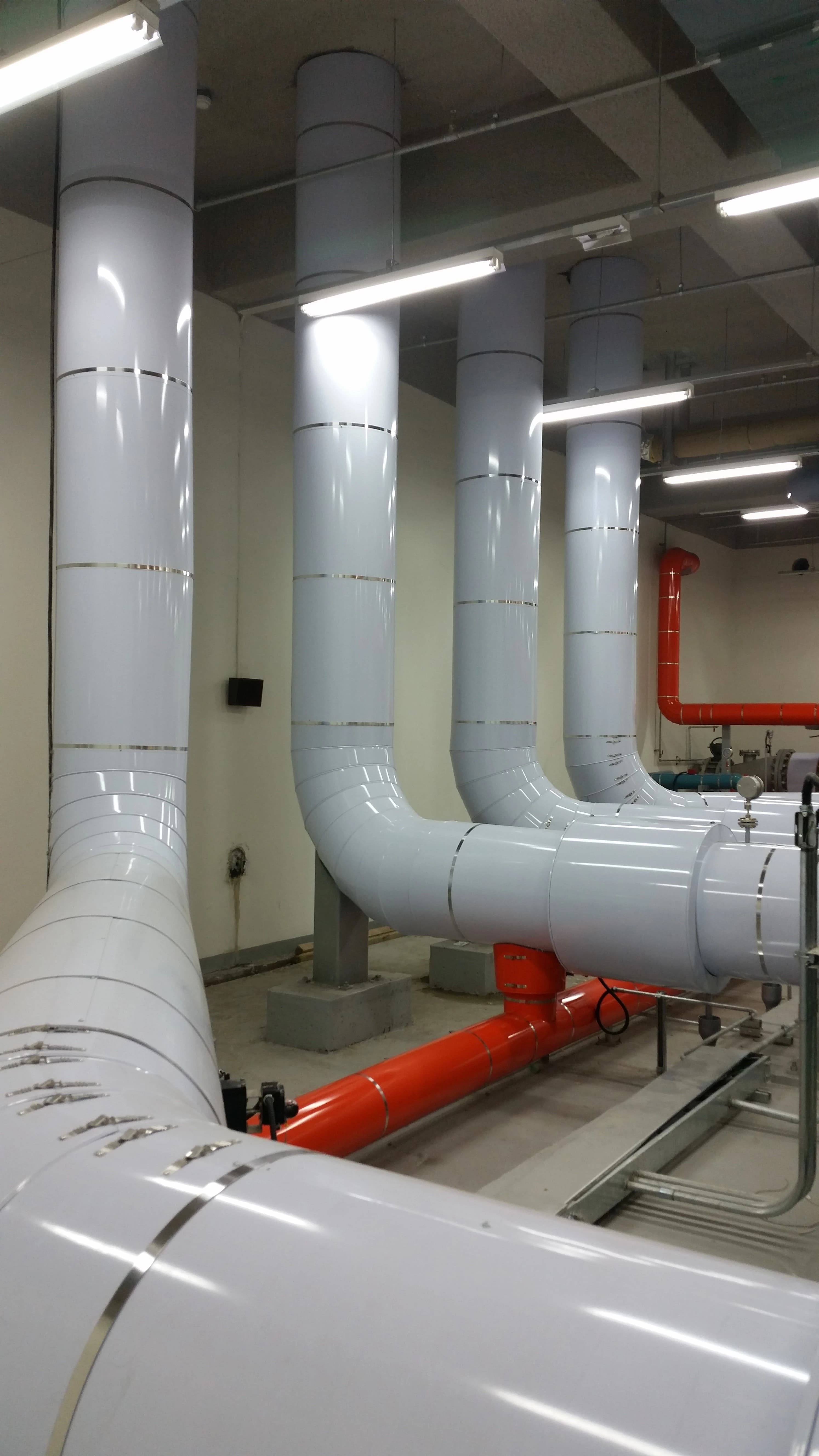 White ClickClad pipework in a plant room